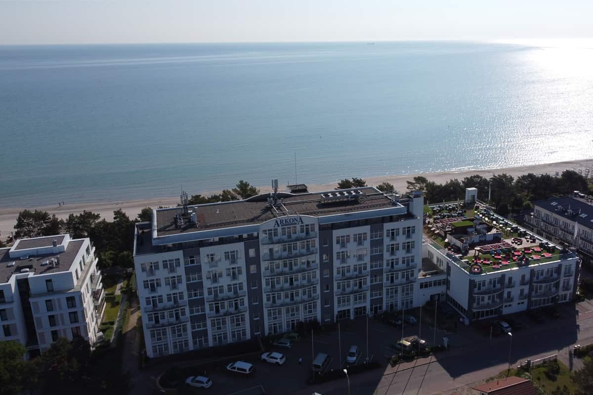 Aerial view of Arkona Strandhotel Binz directly by the Baltic Sea with beach promenade on Rügen