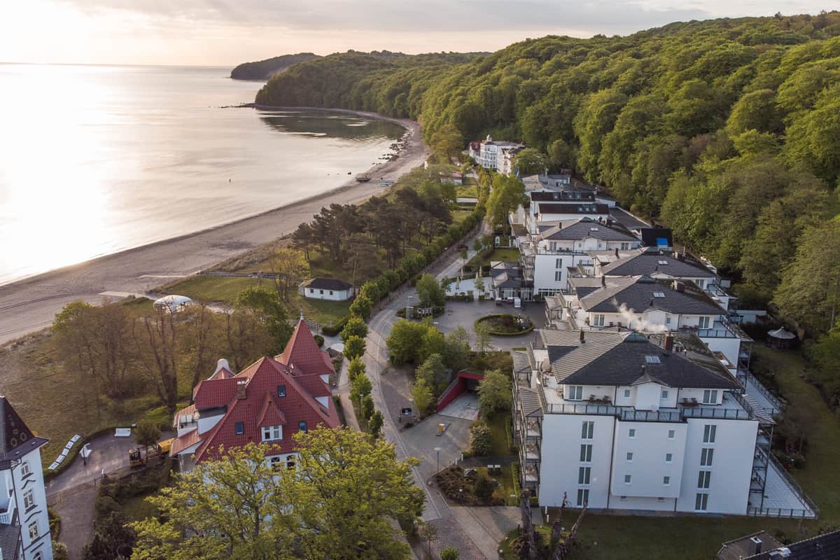 Aerial view of Grand Hotel Binz on Rügen between Baltic Sea beach and coastal forest